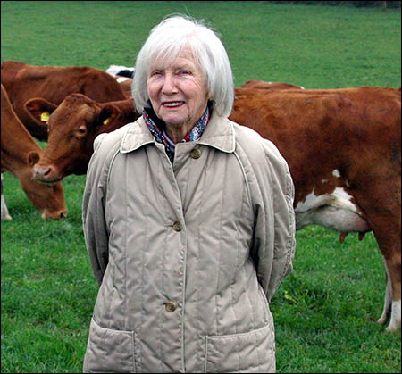 Photo of Dinah Williams with cows