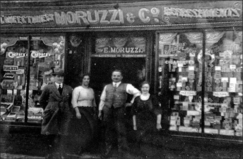 Photo of Ernesto Moruzzi and shop c.1920