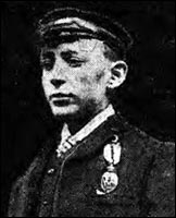 Photo of Tom Lewis with medal