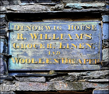 Photo of old shop sign at Dinorwig House