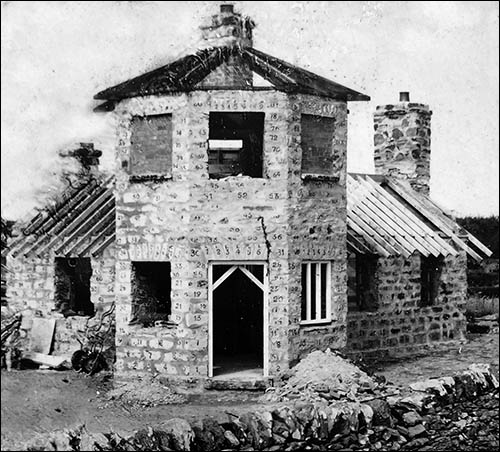Photo of Stanley toll house being rebuilt