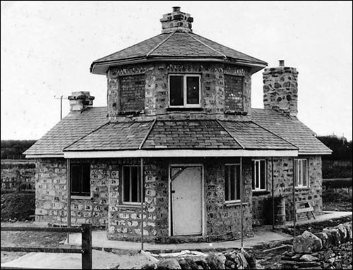 Photo of newly rebuilt Stanley toll house