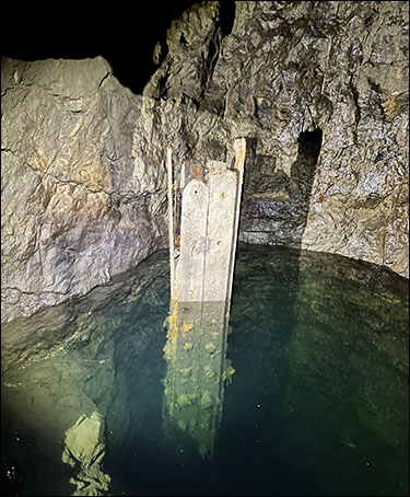 Photo of copper mine tunnel with pumping roads