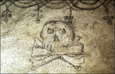 Photo of skull drawing in Llangelynnin church