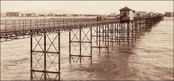 Old photo of Rhyl pier from the sea end